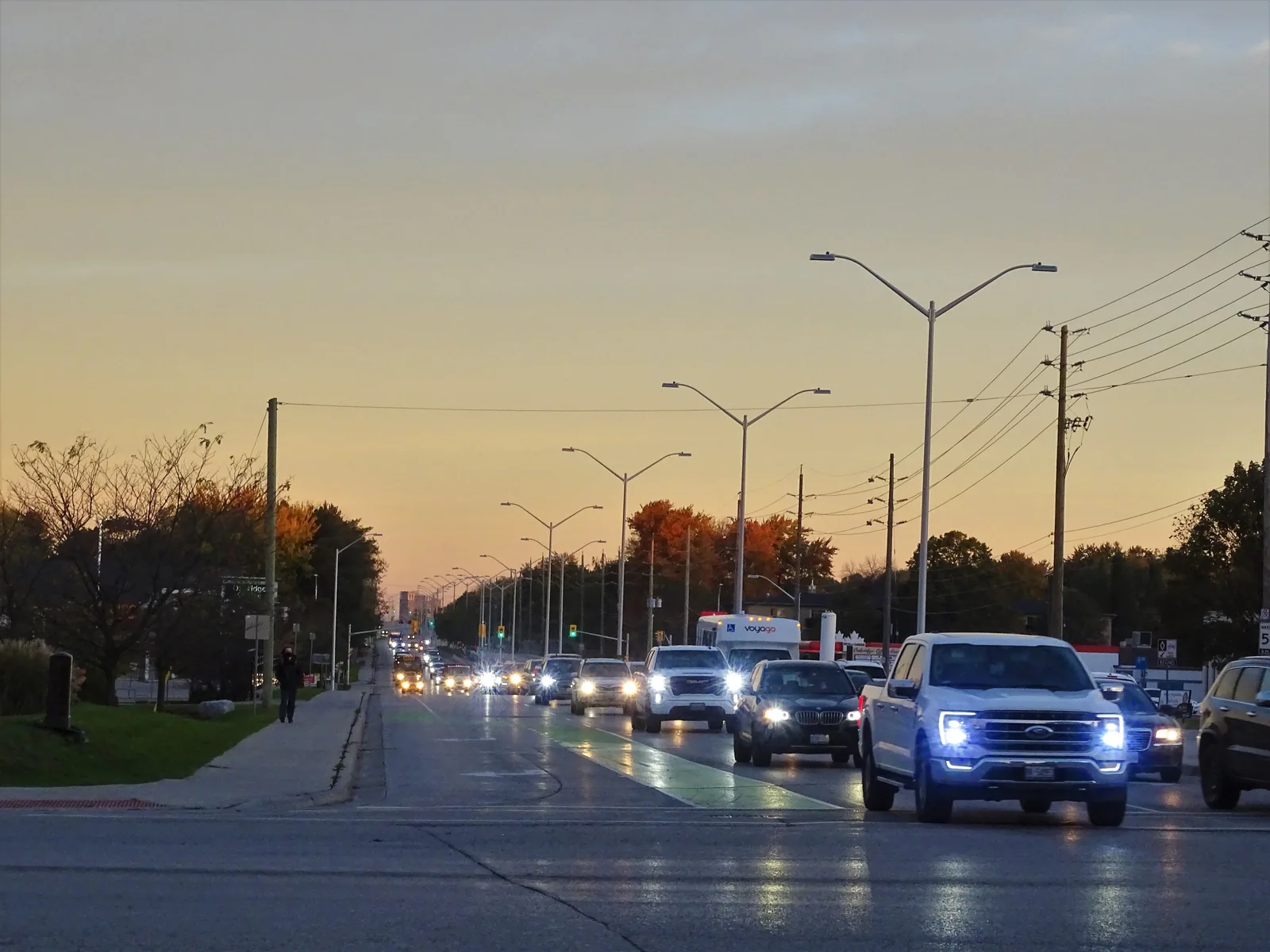 Hyde Park Road looking north from Oxford Street West, at dusk.